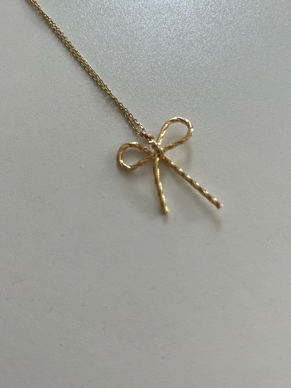Urban Outfitters Gold Bow Pendant Necklace - Women Jewelry